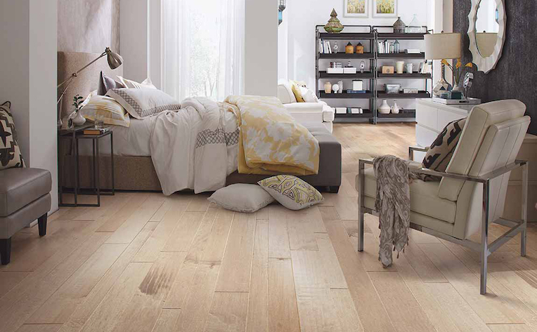 hardwood flooring in a bright bedroom
